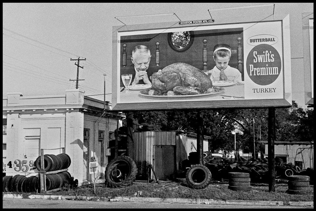 Turkey billboard at a used tire dealership in Houston, 1963