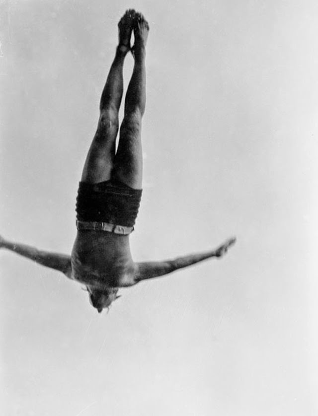 Diving in, under summer skies