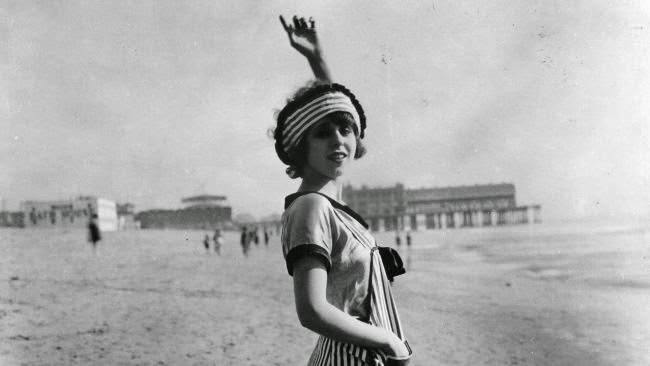 Mack Sennett bathing belle modeling swimwear on the beach, 1921