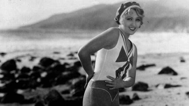 Joan Blondell modeling on the beach, 1929