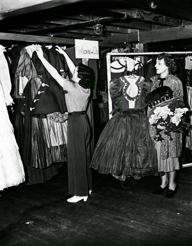 Costumes in the women's wardrobe department, The Wizard of Oz, 1939