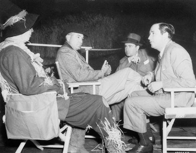 Ray Bolger with Victor Fleming, Bobby Connolly, and Mervyn LeRoy, The Wizard of Oz, 1939