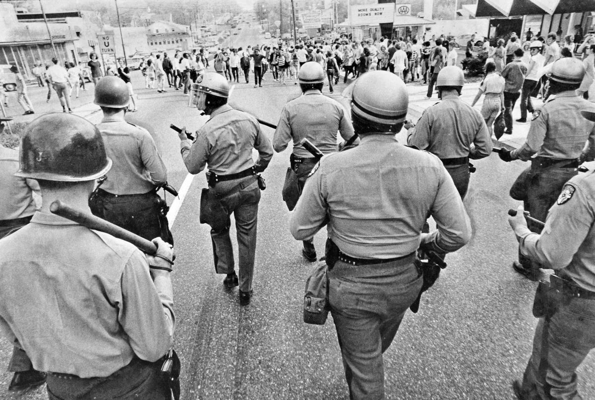 State police advance south on U.S. Route 1 near Calvert Road in College Park, Maryland on May 1, 1970 after a mass demonstration on campus protesting the expansion of the Vietnam War into Cambodia spilled over into an occupation of the highway.