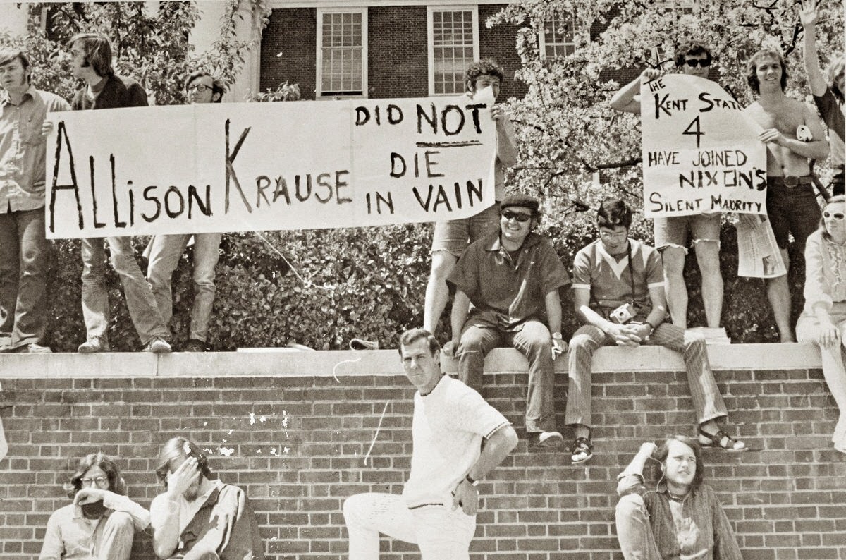 Students at the University of Maryland hold signs up in front of McKeldin Library condemning the killing of four students by Ohio National Guardsmen at Kent State University.
