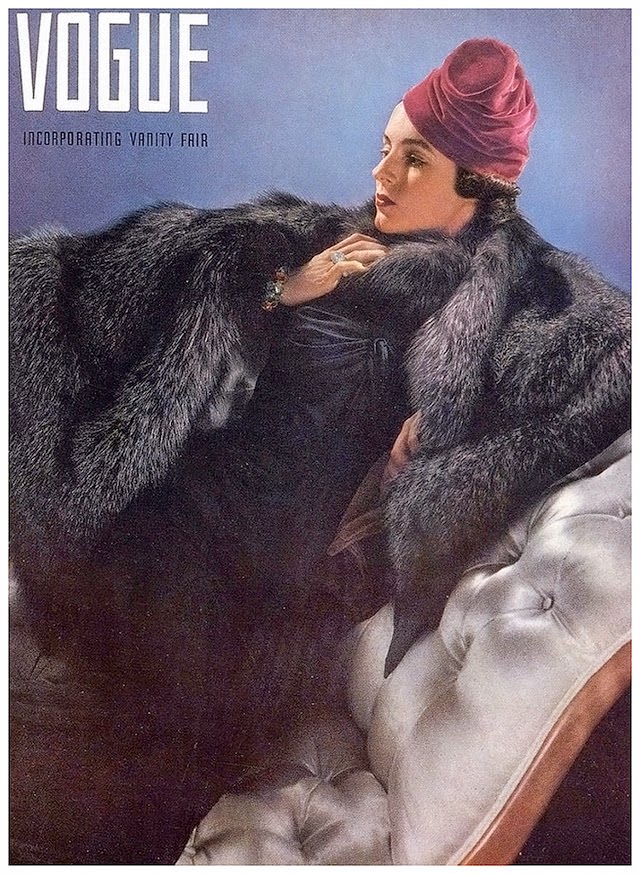 1936 Model in silver fox cape and velvet hat by Lilly Dachè, American Vogue cover by Edward Steichen, August 1, 1936
