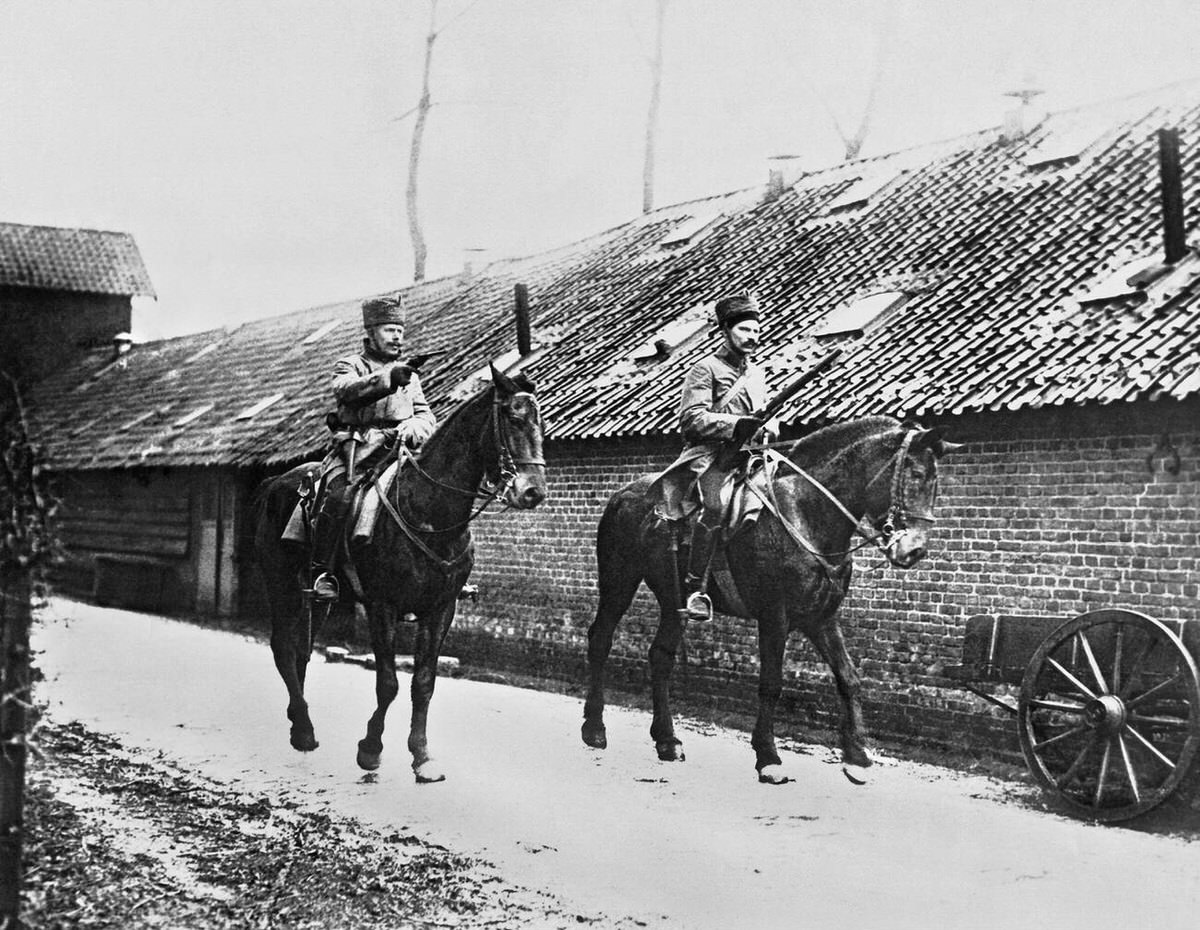 German cavalrymen entering a French village, 1915