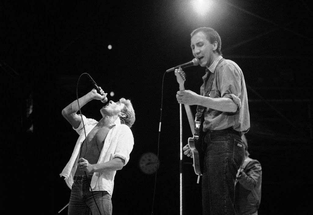 Sting and Mark Knopfler of Dire Straits during the Live Aid famine relief concert at Wembley Stadium, 1985