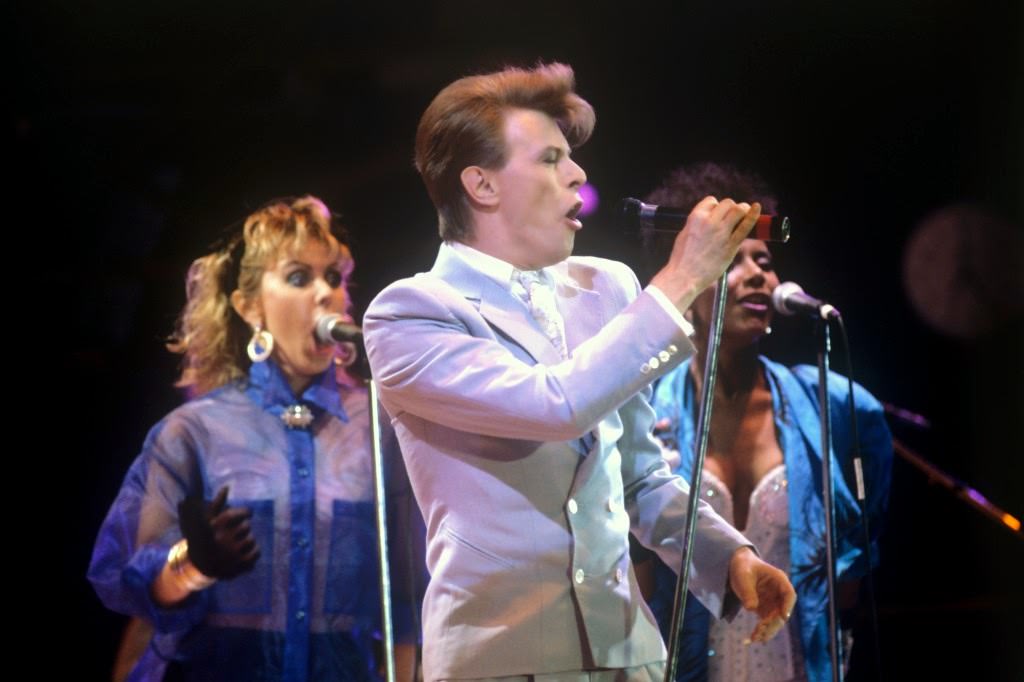 David Bowie and backing singer Tessa Niles performing on stage at Live Aid, 1985