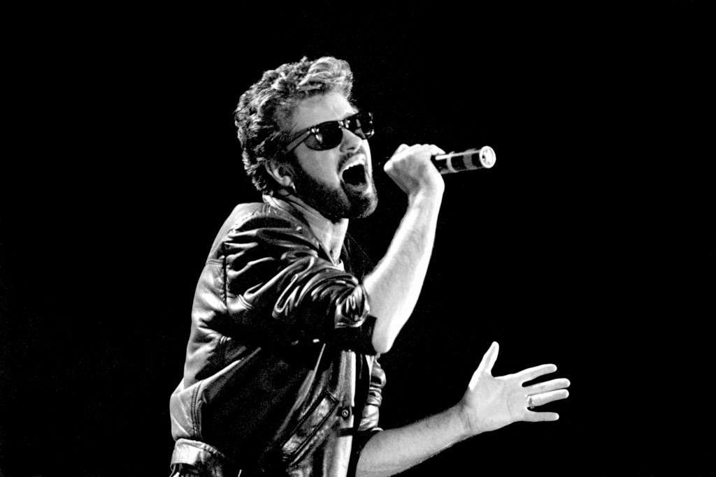 George Michael of Wham performing at Live Aid, 1985