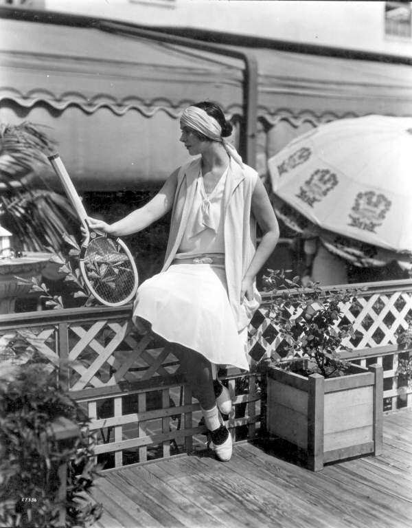 Woman modeling tennis fashions at Burdine's in Miami, 1929