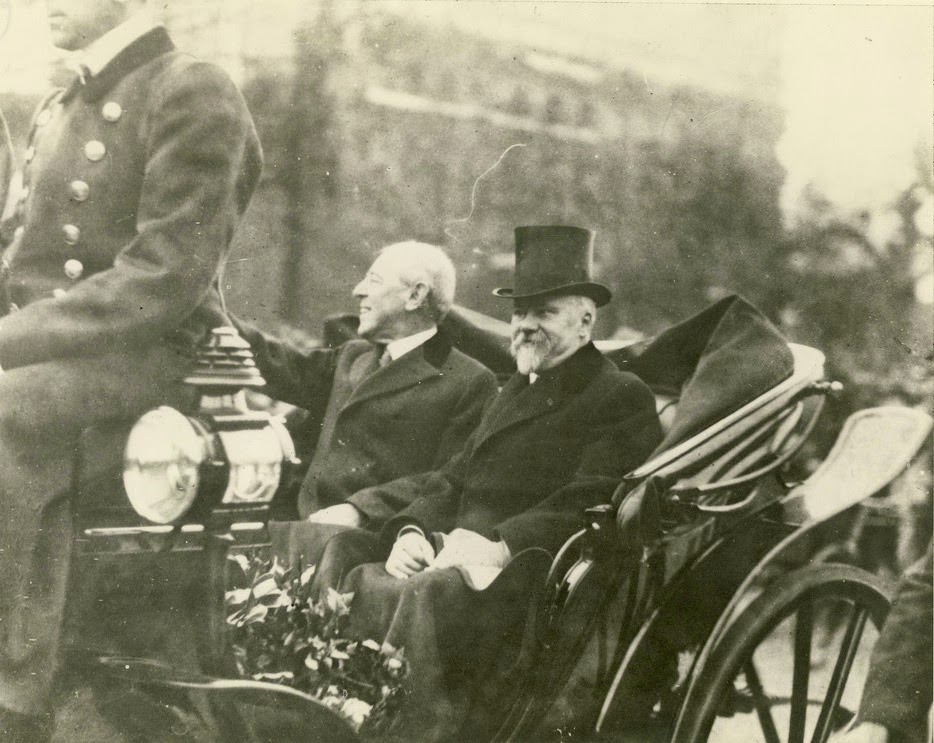 Wilson and President Poincare on parade in Paris, France.