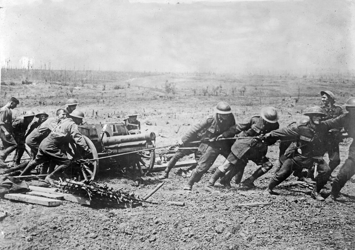 British soldiers with a captured German gun near Wytschaete, Belgium, 1917