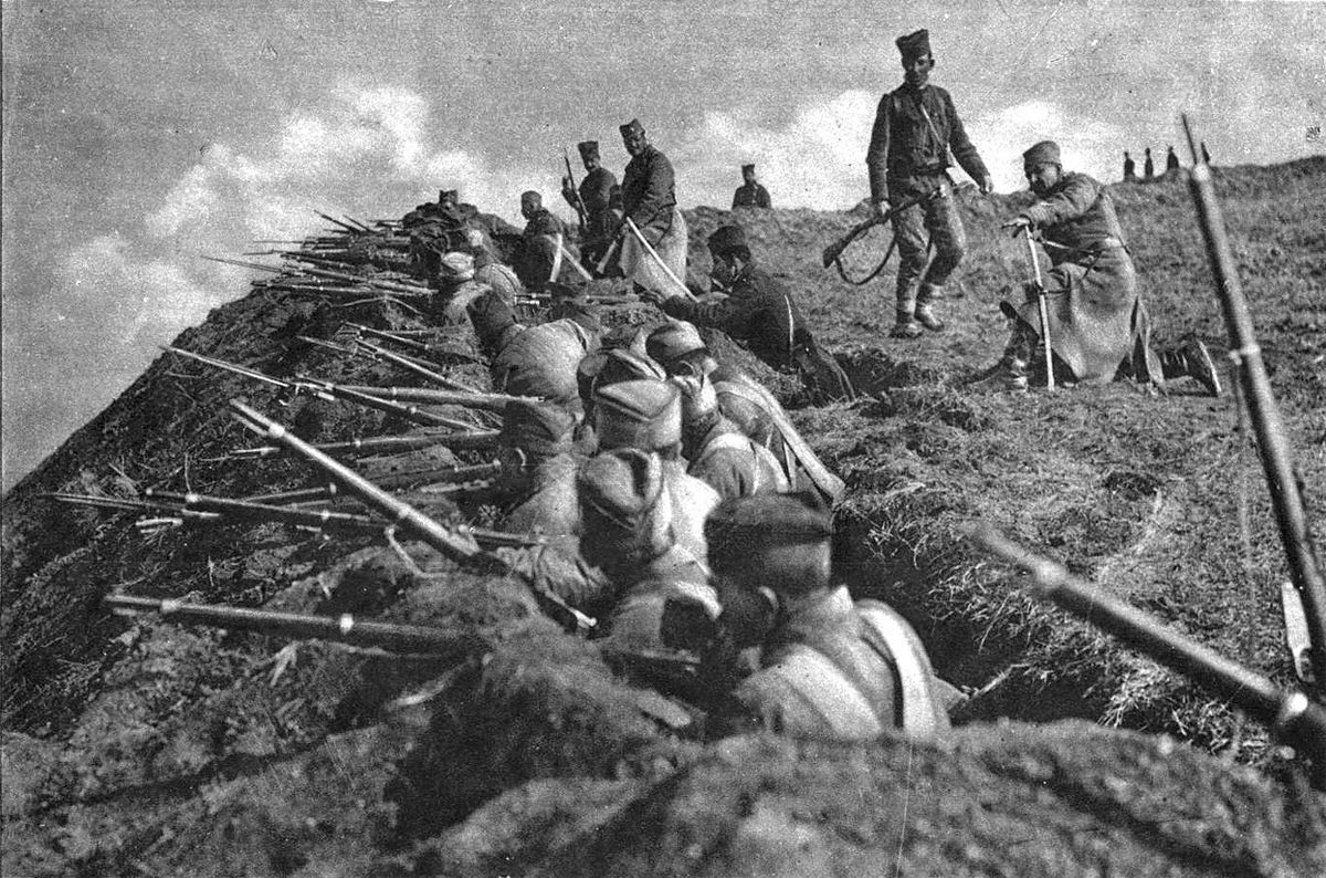 Serbian soldiers manning a hilltop trench, 1914