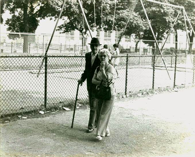 Elderly couple walking in Seth Low Park, Brooklyn, 1978
