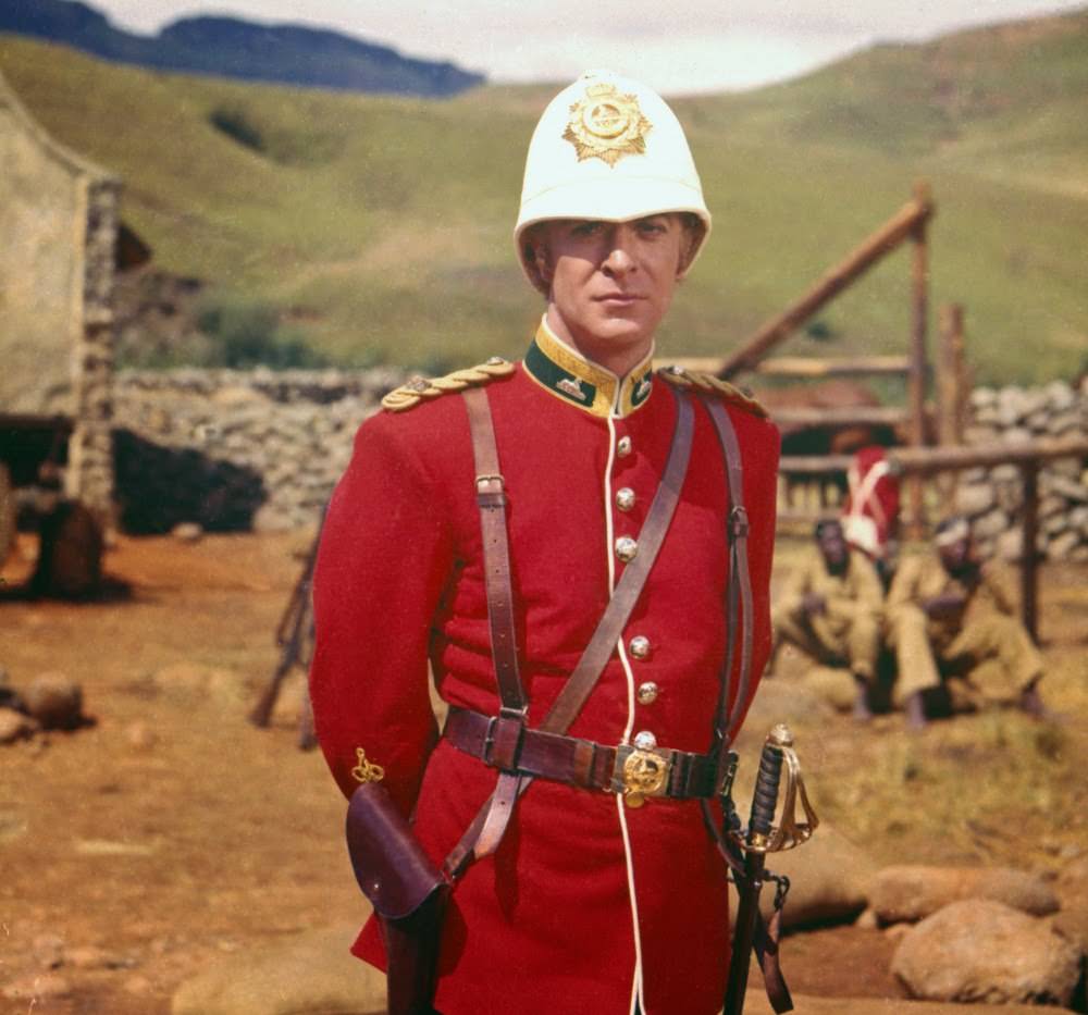 All dressed up for stardom: Caine poses in uniform for a portrait between takes. He quickly found himself one of the biggest actors in 1960 British cinema, after his star-making turn here playing infantry officer Lieutenant Gonville Bromhead.