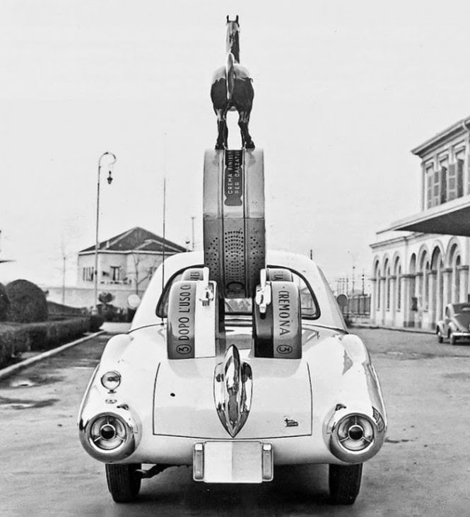 The back of a car made by Fissore for Cavallino shoe polish, with aluminum box and logo