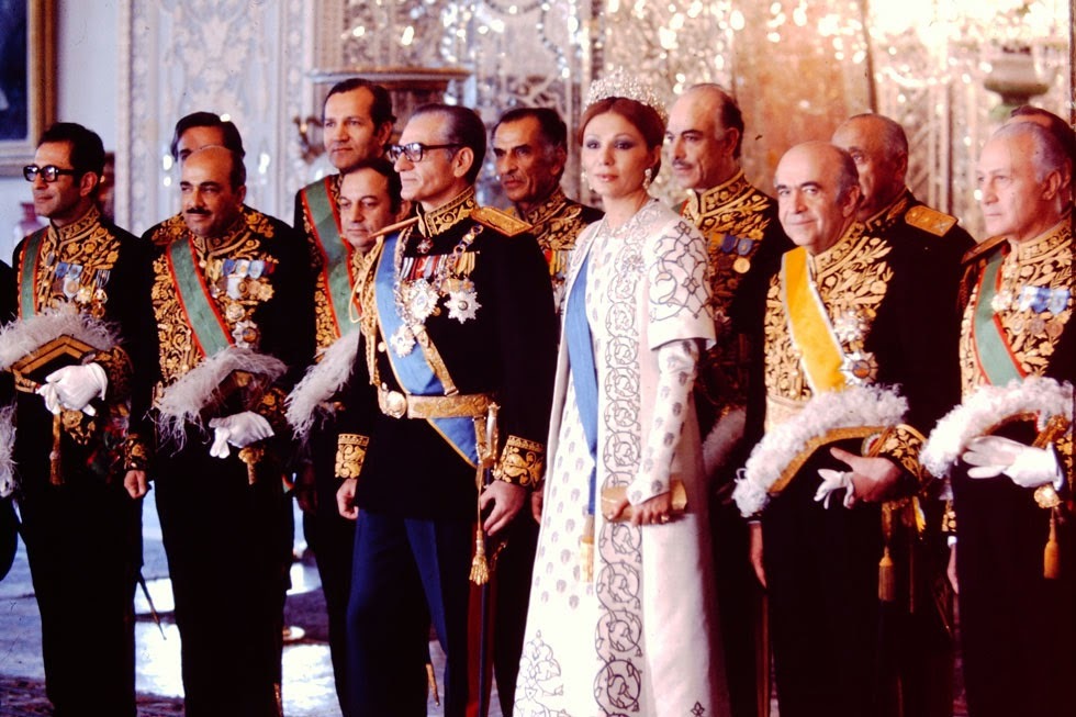 The Shahanshah Mohammad Reza Pahlavi and Shahbanu Farah Pahlavi at a court reception surrounded by the Shah's ministers of state.