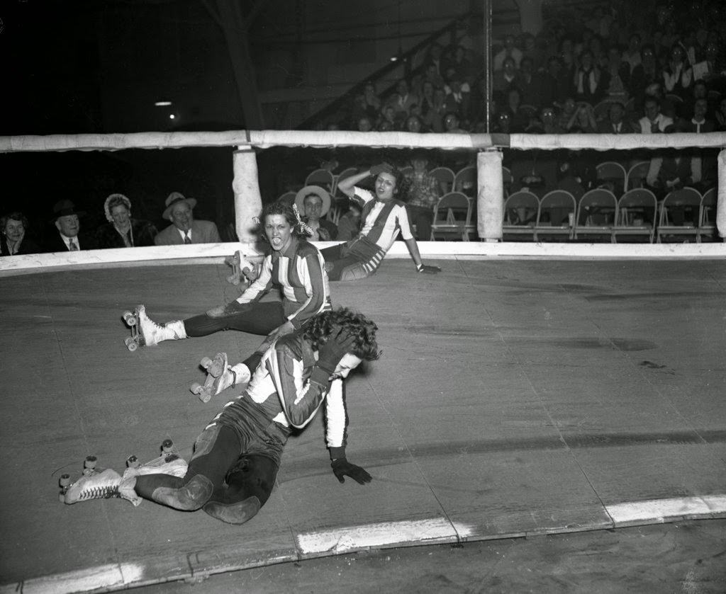 Mary Lou Palermo yells to the Jersey Jolters who caused a three-way spill at the Roller Derby at the Coliseum, 1950s