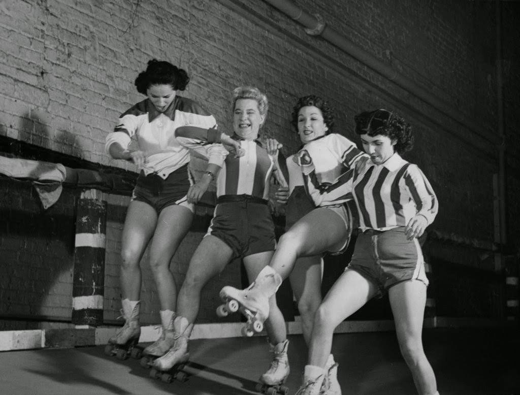 Anne Pernice, Midge “Toughie” Brashun, Mary Lou Palermo and Jean Porter get tangled up during a match at the Chicago Coliseum, 1950s