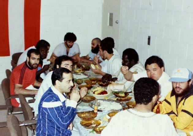 Osama Bin Laden (C, top) having a meal with fellow judo members in Riyadh, as identified by Taiwanese judo coach Jimmy Wu (2nd R)